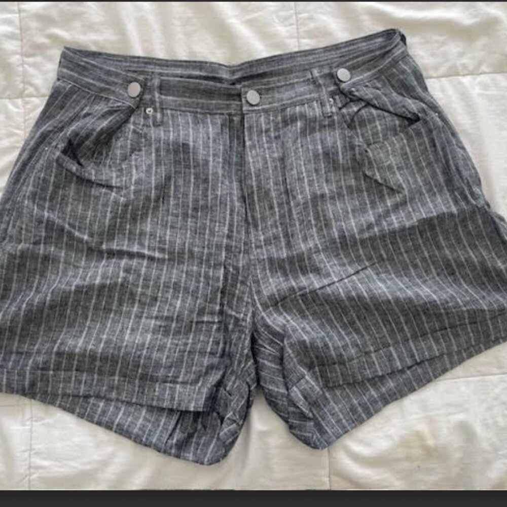 Grey and white striped pleated shorts by Olivaceous